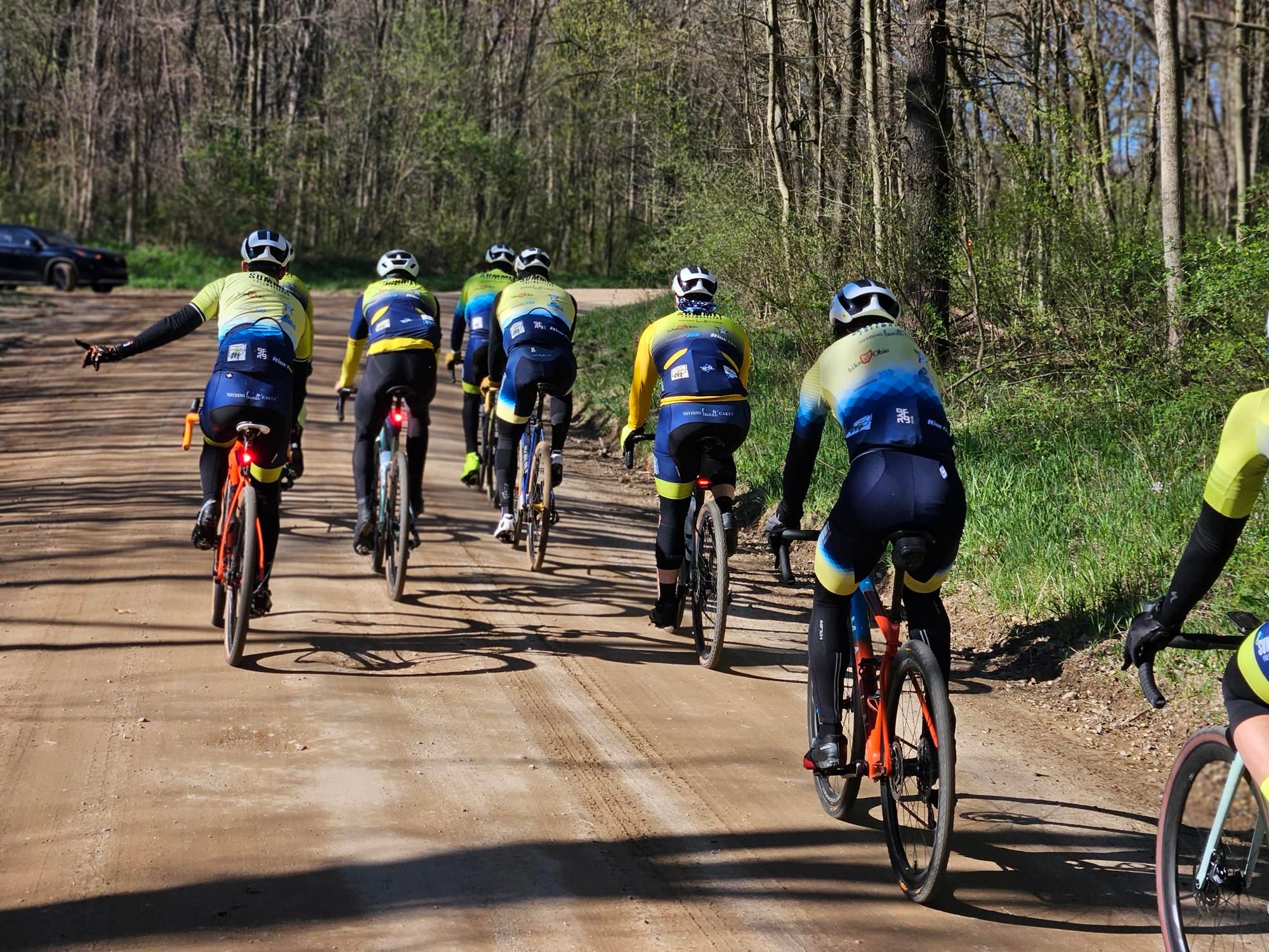 Cyclists gather on their bikes for the Summit Spring Criterium